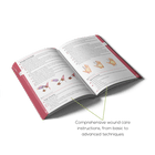 Open First Aid book with wound care instructions, from basic to advanced techniques