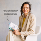 Editor-in-chief holding the Dutch edition of the pocket