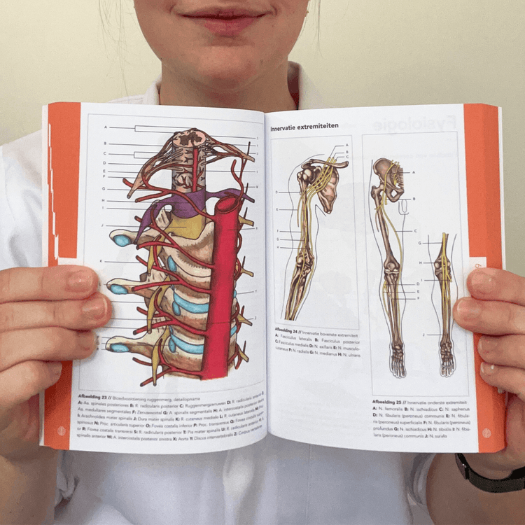 Medical student holding the Neurology pocket guide