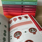 Open ob-gyn book with illustrations 